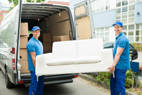 Man and van team preparing a safe move with loaded vehicle