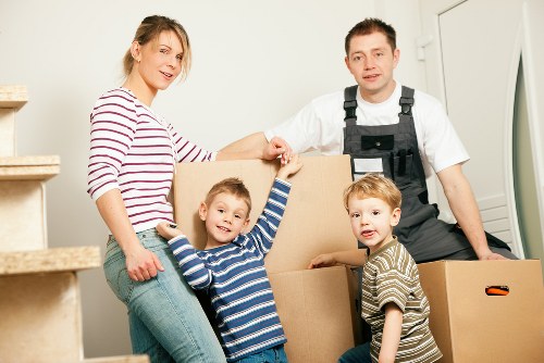 Packed boxes and furniture ready for a home removal service