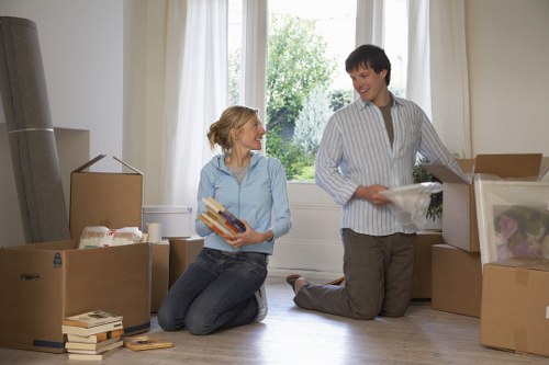 Movers carrying student furniture from a Roehampton property