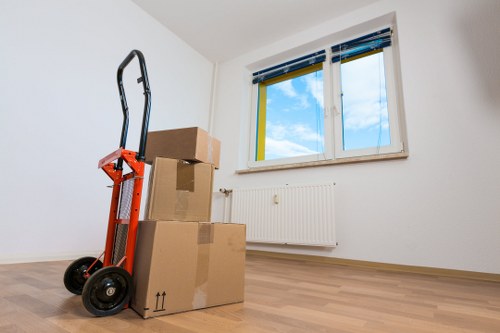 Furniture and boxes being loaded for a Roehampton relocation