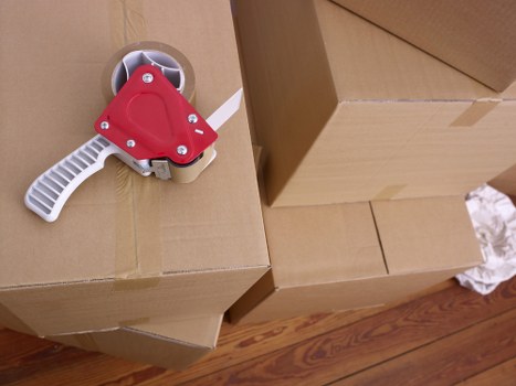 Professional movers handling a family house move in Roehampton