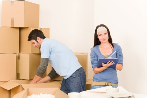 Sorted boxes and furniture prepared for reuse and recycling in southwest London